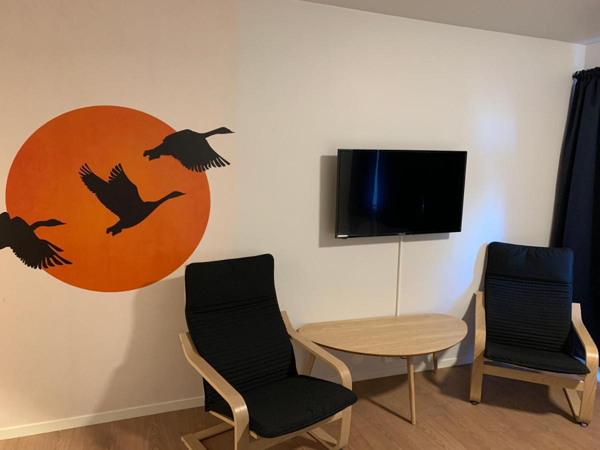 Husnes Sentrum Hotell Bagian luar foto