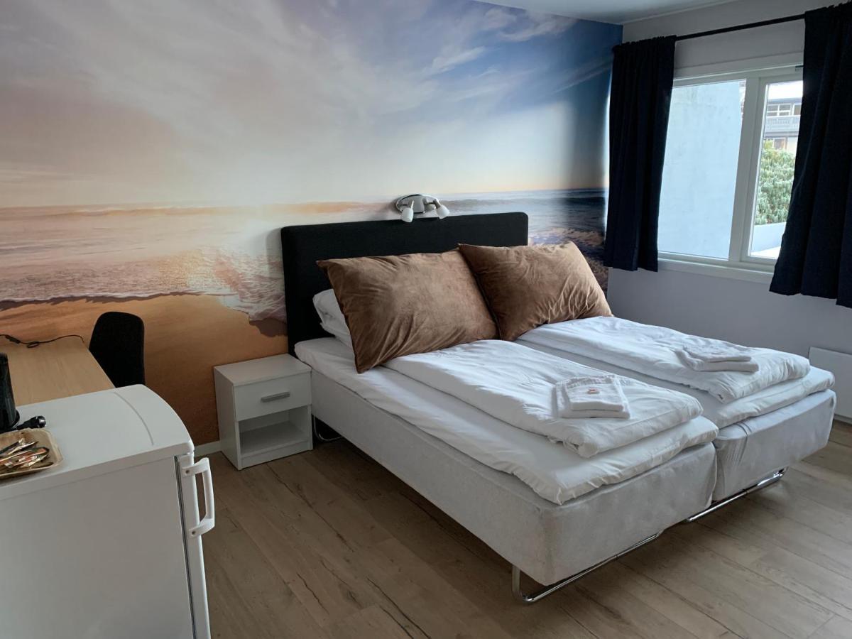 Husnes Sentrum Hotell Bagian luar foto