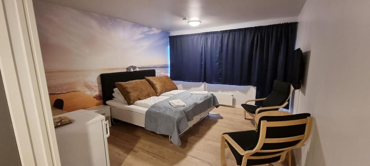 Husnes Sentrum Hotell Bagian luar foto