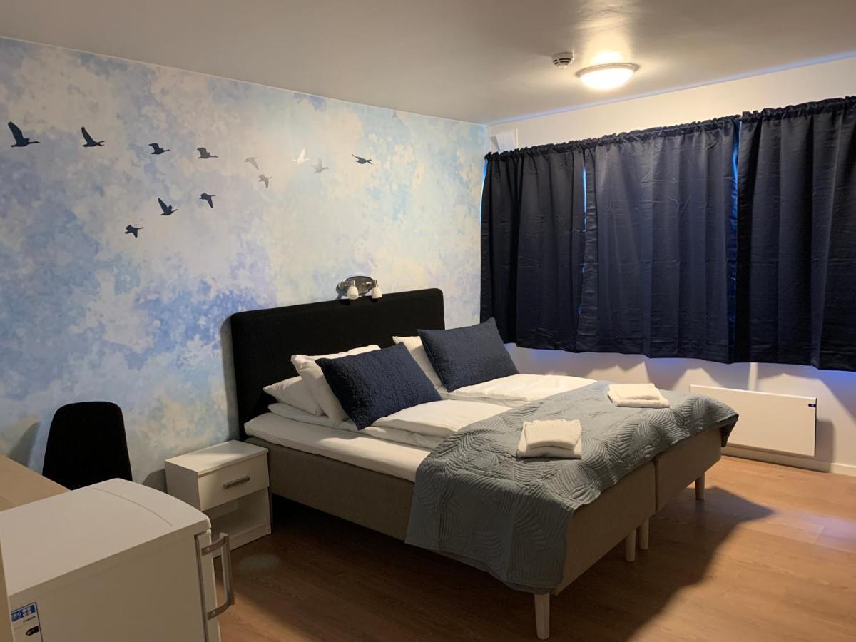 Husnes Sentrum Hotell Bagian luar foto