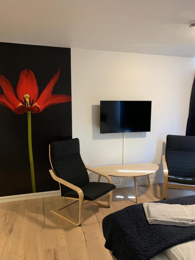 Husnes Sentrum Hotell Bagian luar foto