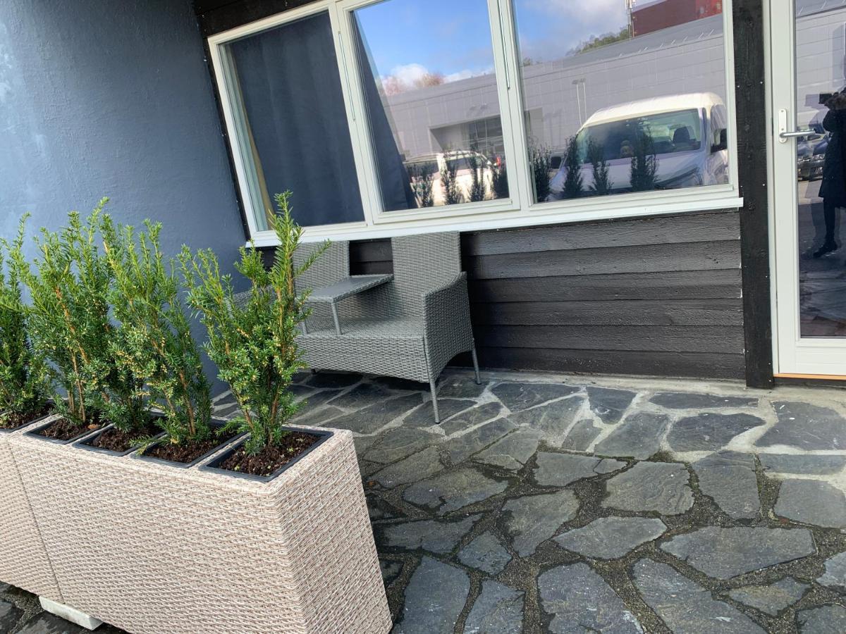 Husnes Sentrum Hotell Bagian luar foto