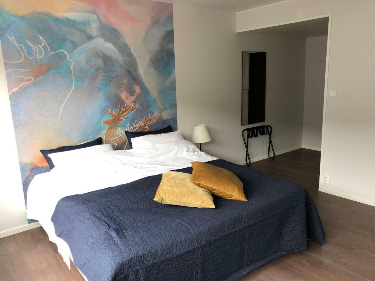 Husnes Sentrum Hotell Bagian luar foto
