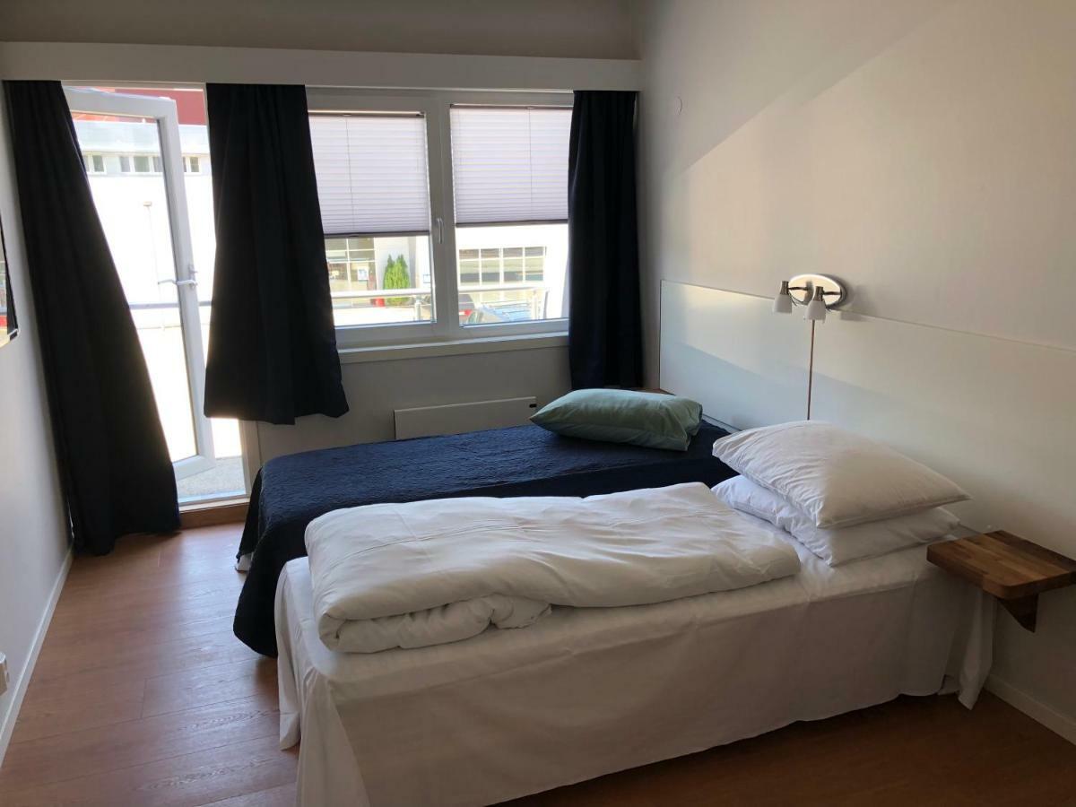 Husnes Sentrum Hotell Bagian luar foto