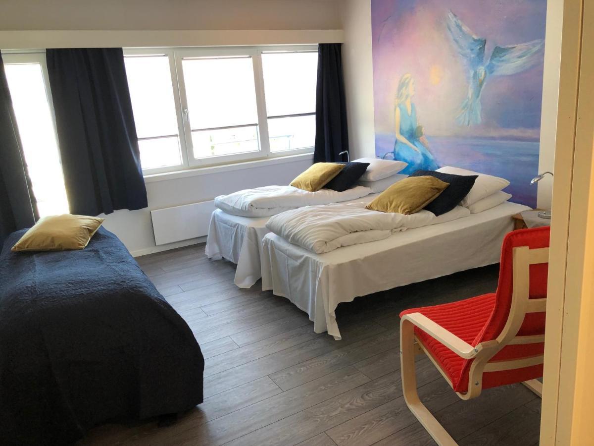Husnes Sentrum Hotell Bagian luar foto