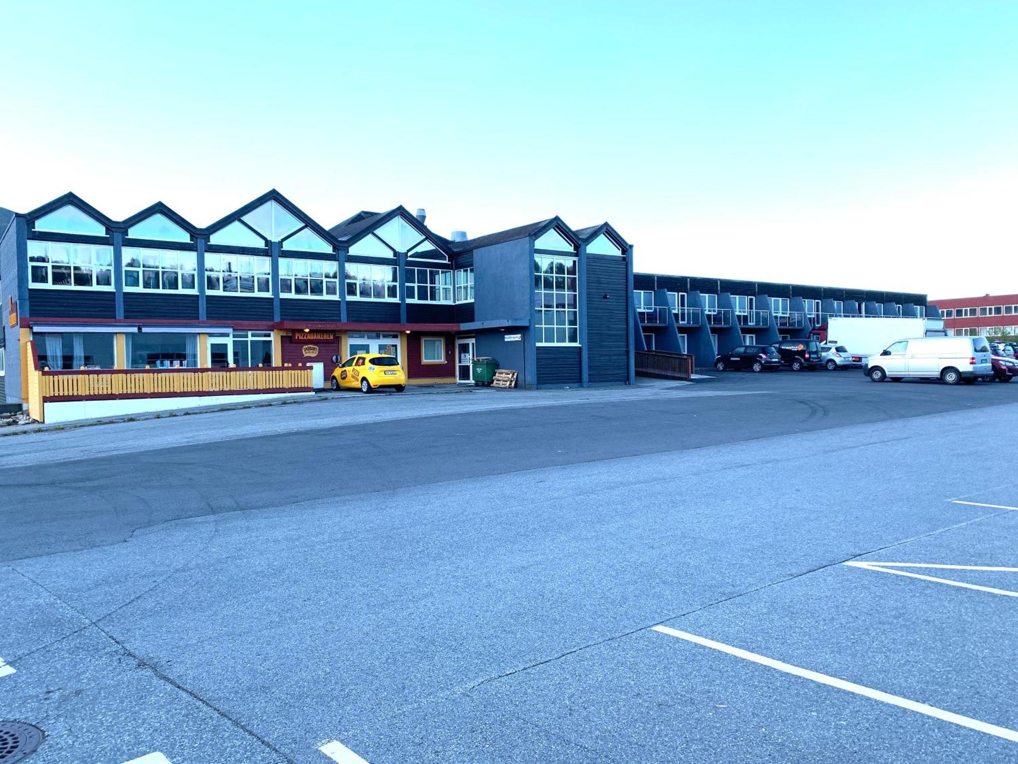 Husnes Sentrum Hotell Bagian luar foto